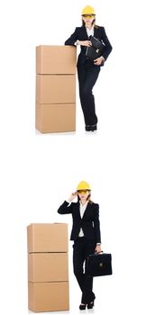 Woman builder with box isolated on white 