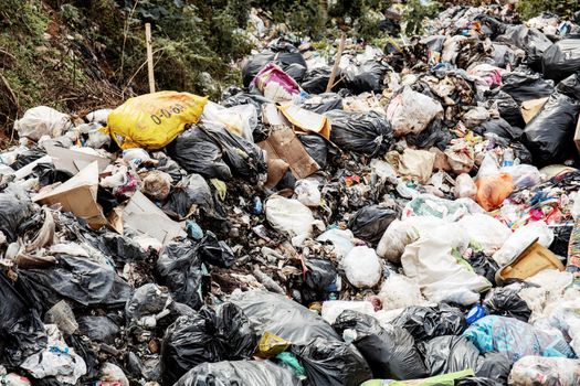 Garbage in abandoned pond in the countryside.