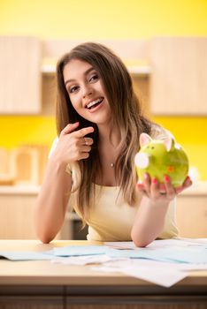 Young woman wife in budget planning concept