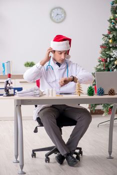 Doctor on the shift on christmas eve