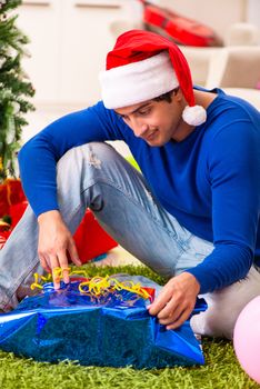 Pregnant wife celevrating christmas with husband