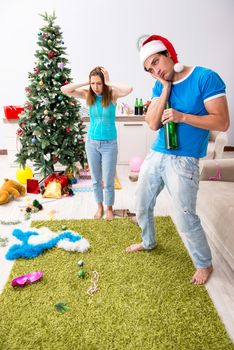 Young family celebrating christmas at home