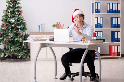 Telesales operator during christmas sale on the phone