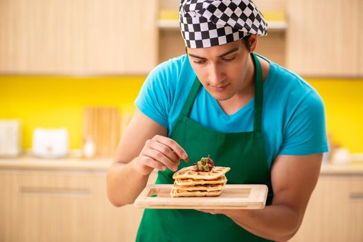 Man cook preparing cake in kitchen at home