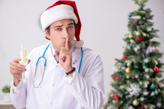 Doctor on the shift on christmas eve
