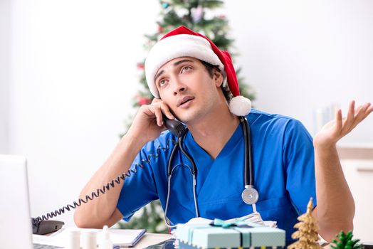 Doctor with gift box in the hospital