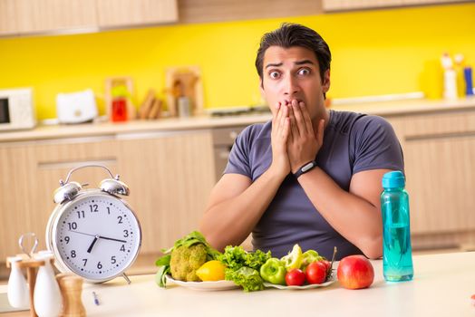 Young man in dieting and healthy eating concept