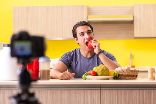 Young man blogging about food supplements