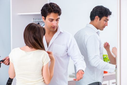 Woman sees her husband off to work 