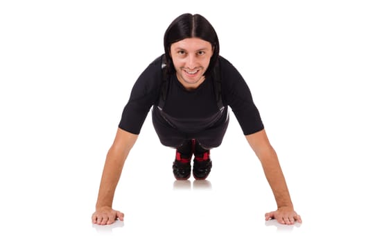 Young man doing exercises isolated on white