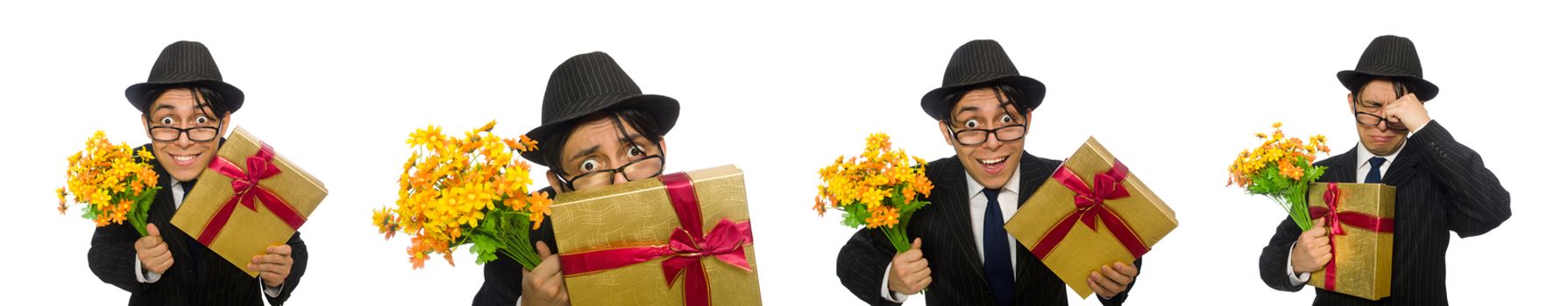 Gentleman with gift box and flowers isolated on white