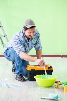 Young man doing home renovation 