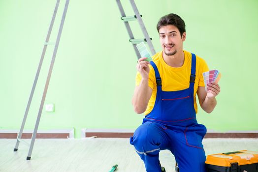 Young man doing home renovation 