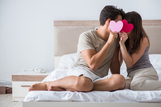 Happy couple in the bed
