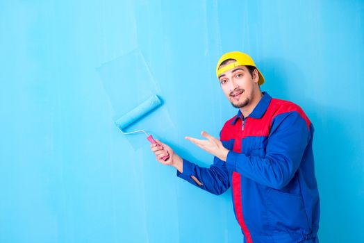 Young painter doing renovation at home 