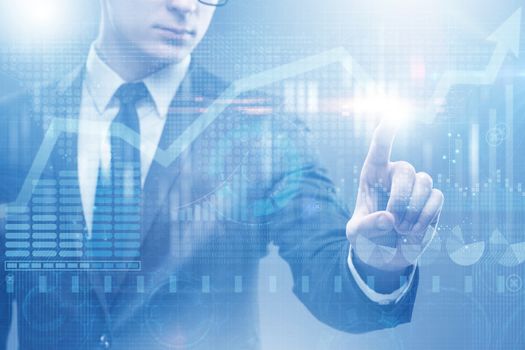BUsinessman pressing virtual button on diagram chart