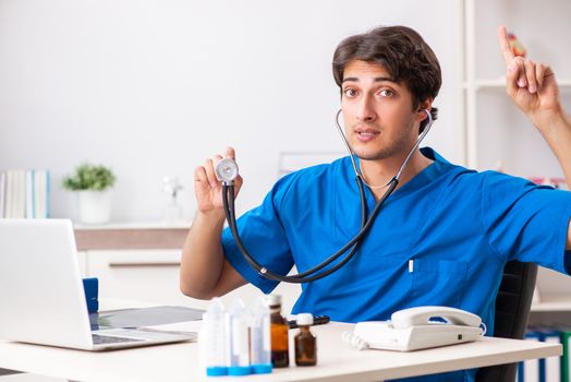 Young doctor working in the hospital