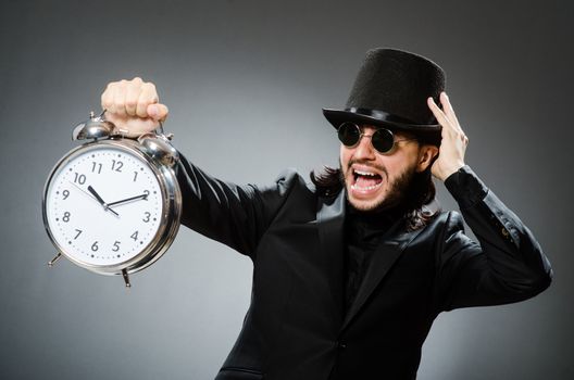 Vintage concept with man wearing black top hat