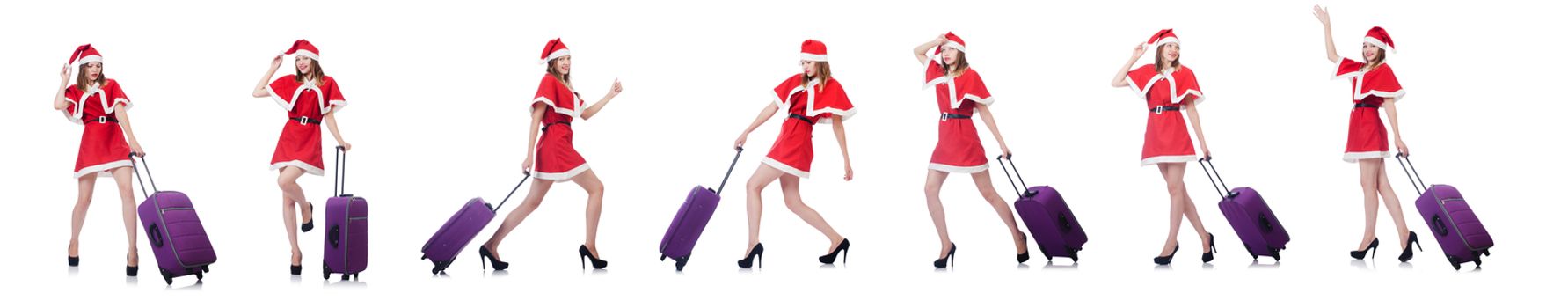 Young woman in red santa costume on white