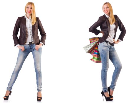 Beautiful woman with shopping bags isolated on white