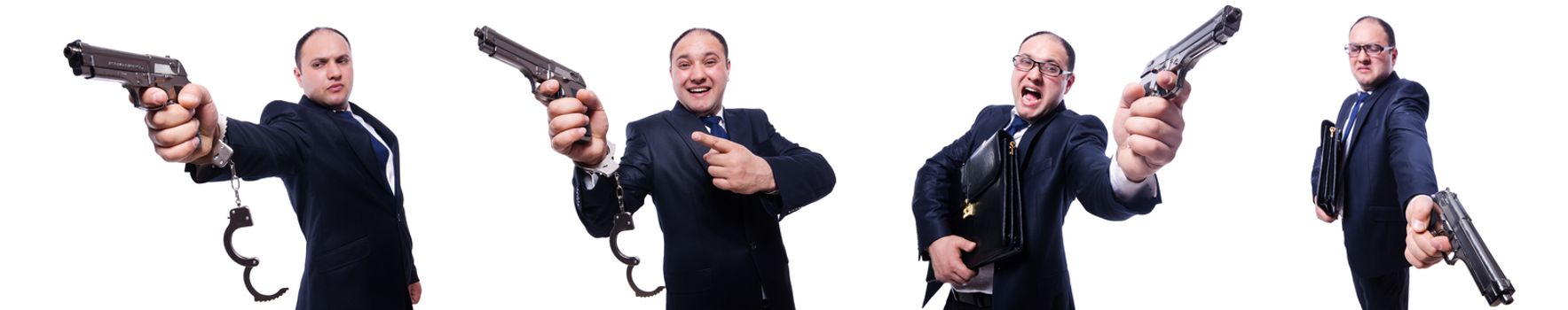 Man with gun and handcuffs on white