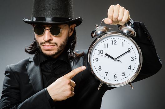 Vintage concept with man wearing black top hat