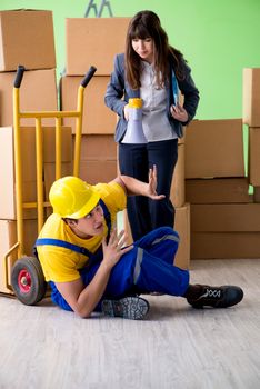 Woman boss and man contractor working with boxes delivery