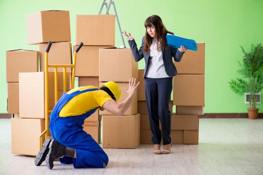 Woman boss and man contractor working with boxes delivery