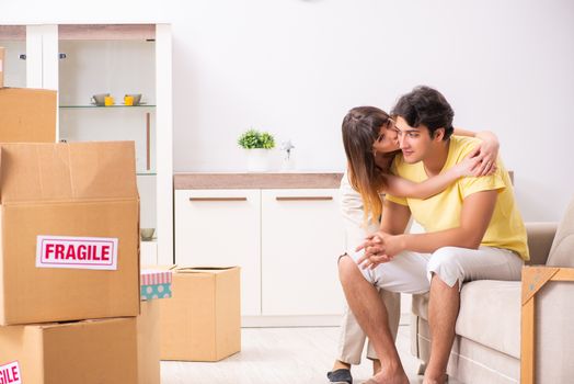 Young pair moving to new flat with fragile things 