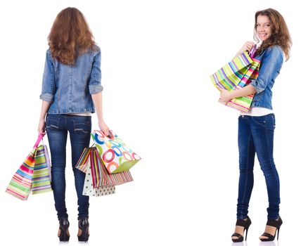 Young woman with shopping bags isolated on white 