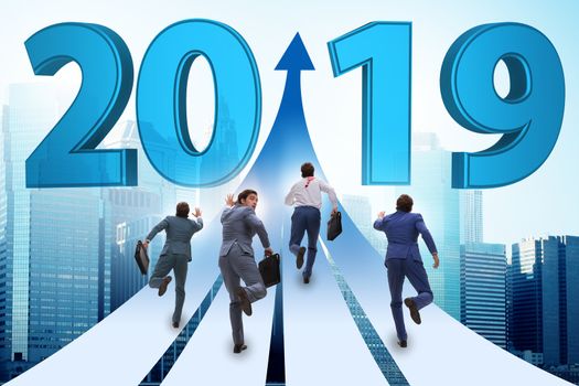 Businessman running into year of 2019