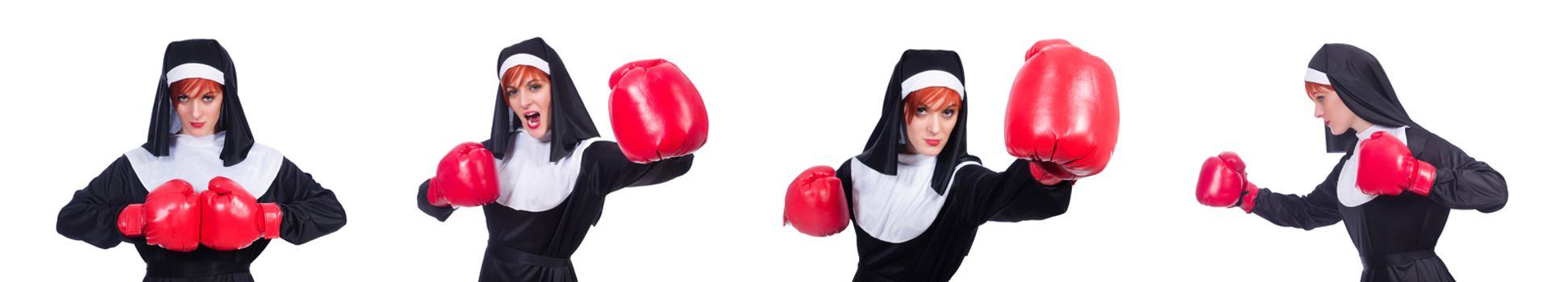 Nun with boxing gloves isolated on white