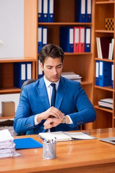 Young employee working in the office