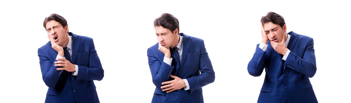 Young sick and unhappy businessman isolated on white background 
