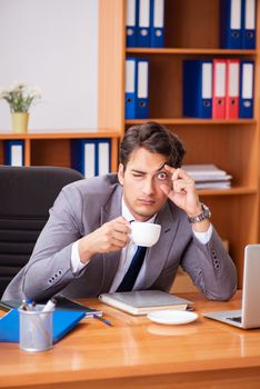 Young employee working in the office