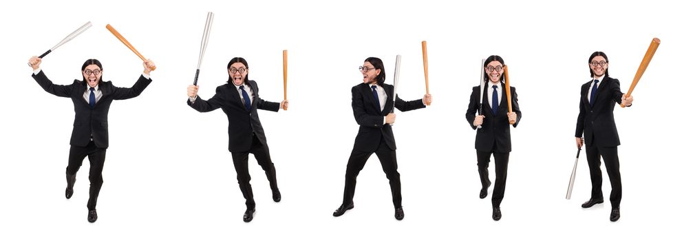 Young elegant man in black suit holding bat isolated on white