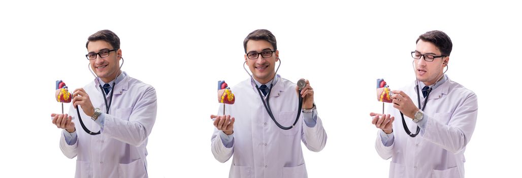 Young doctor with heart shape isolated on white