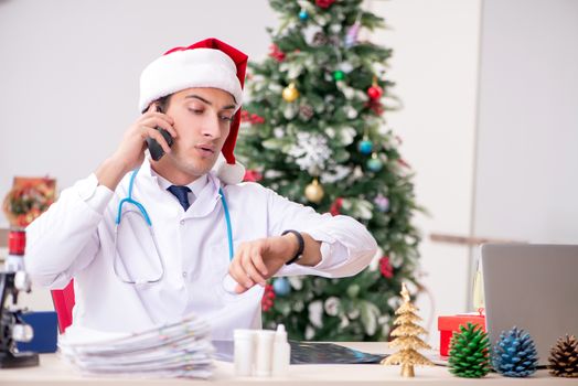 Doctor on the shift on christmas eve