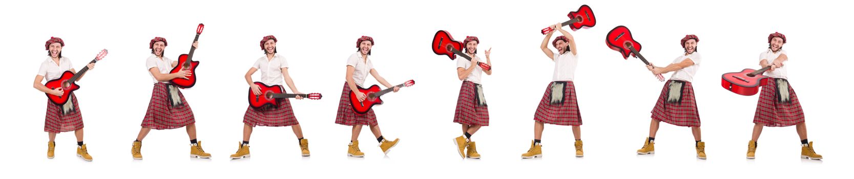 Scotsman playing guitar isolated on white