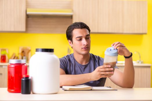 Young man blogging about food additives