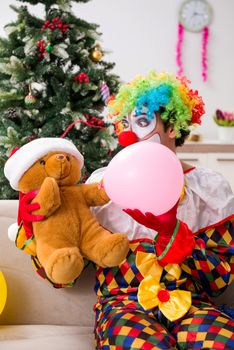 Funny clown in Christmas celebration concept 