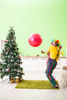 Funny clown in Christmas celebration concept 