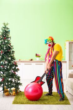 Funny clown in Christmas celebration concept 