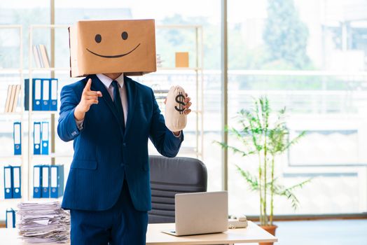 Happy man with box instead of his head