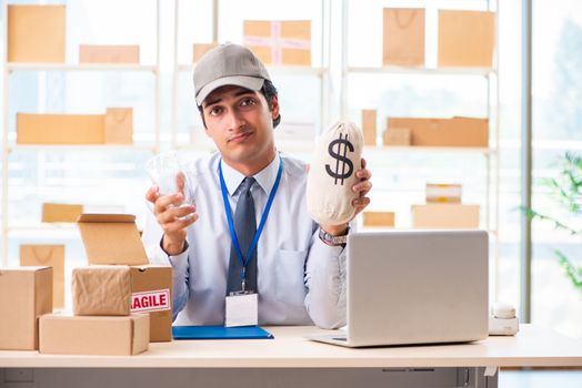 Male employee working in box delivery relocation service