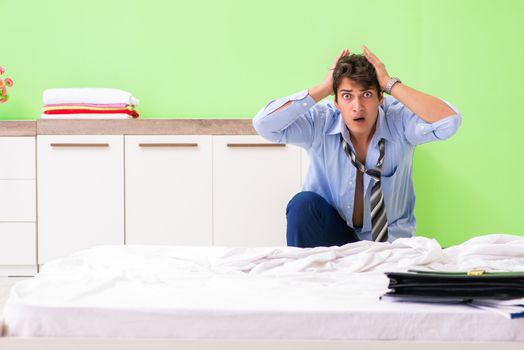 Young businessman employee late for office