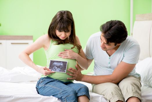 Young family finding out about pregnancy