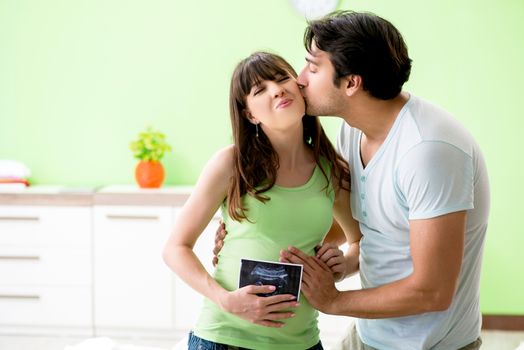 Young family finding out about pregnancy