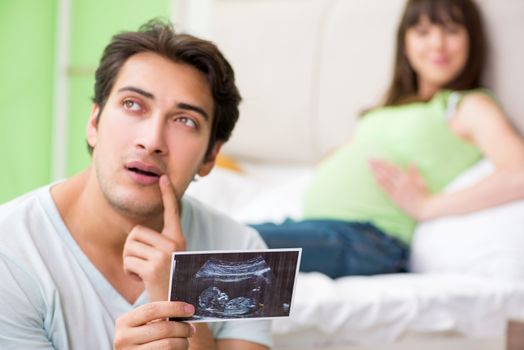 Young family finding out about pregnancy