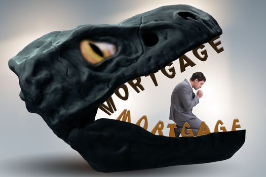 Businessman in the jaws of debt and loan